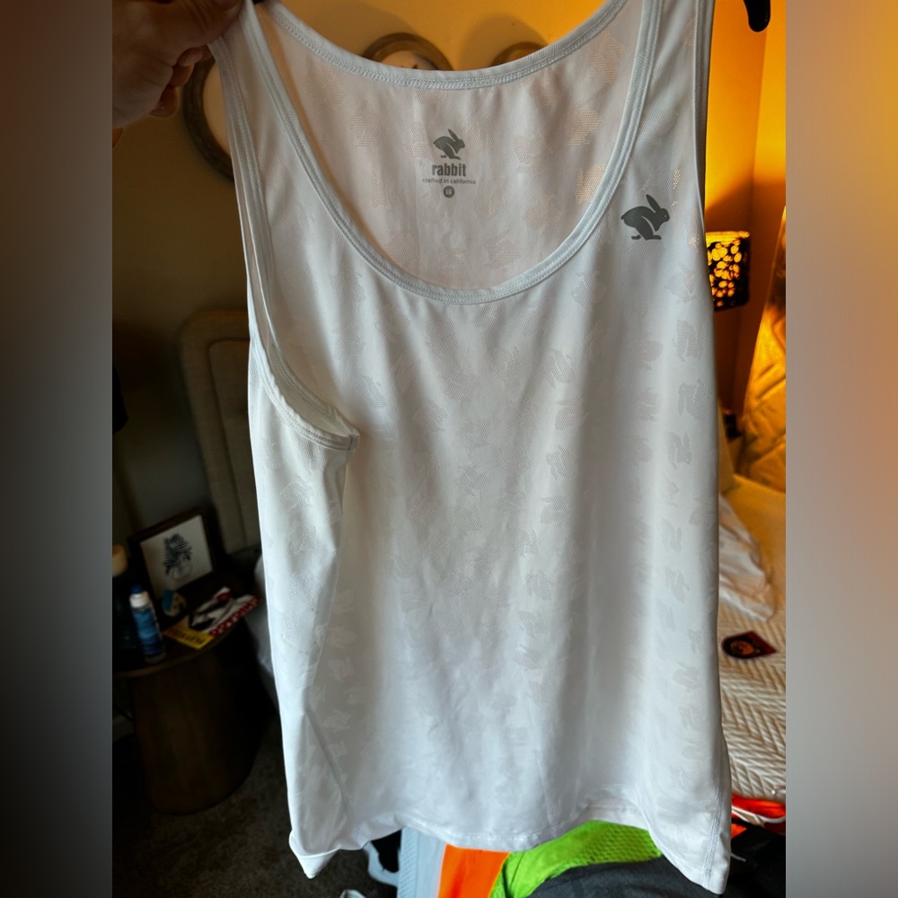 Rabbit champ running singlet. Worn once, practically new. Super cool!